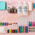 Essential resin art materials for beginners, including epoxy resin, molds, colorants, safety gear, and tools.
